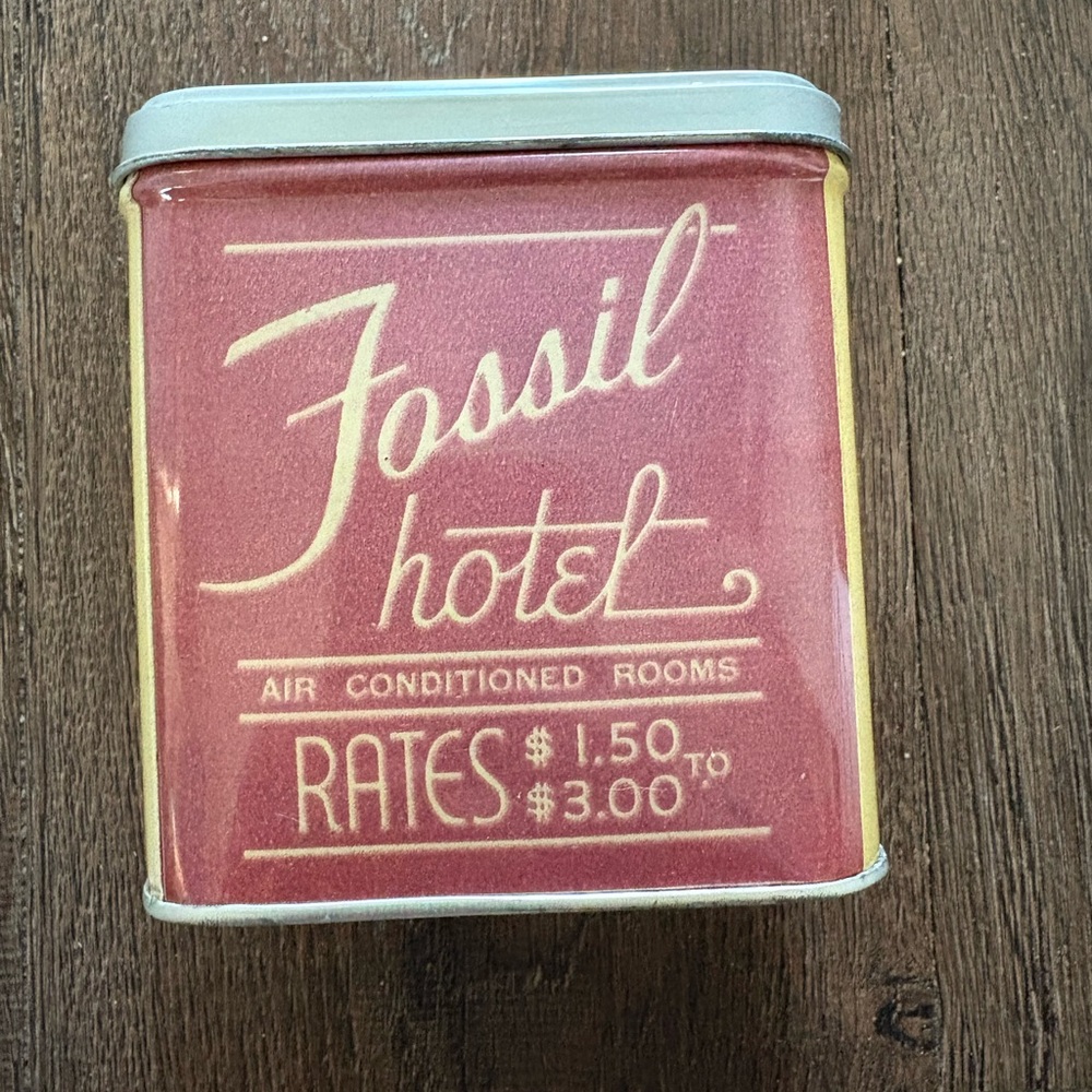 Fossil tin from 1998.  Fossil Hotel.  Size of a bandaid box.